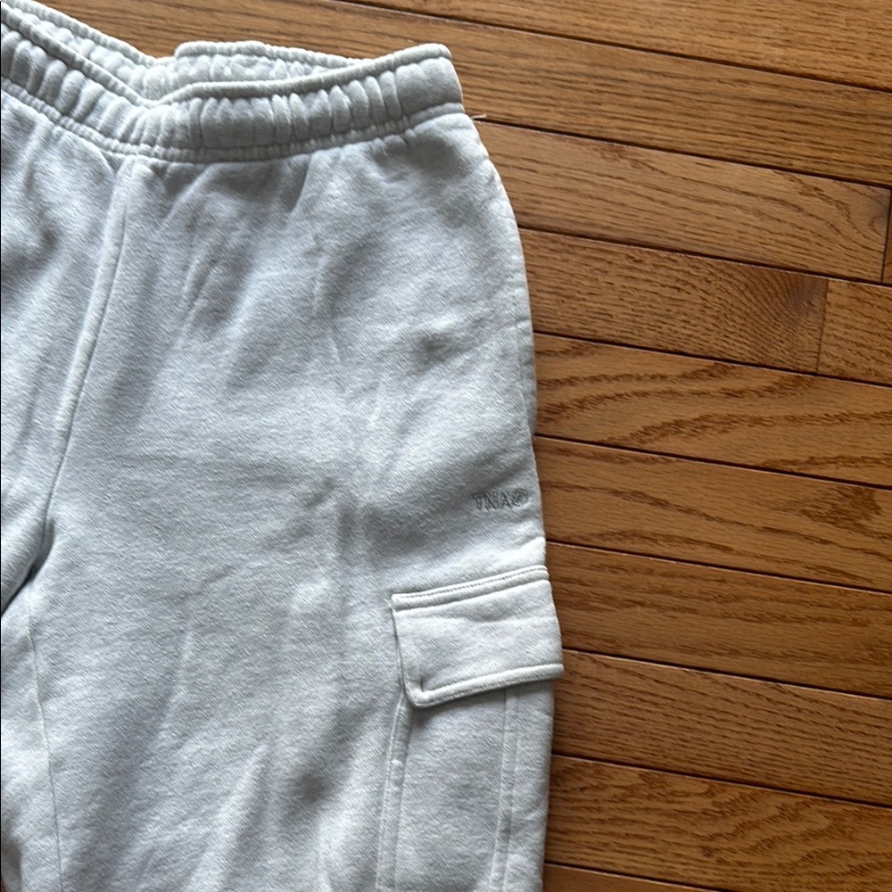 TNA Light Heather Gray Sweatpants with Elastic Waistband and Soft Knit Material